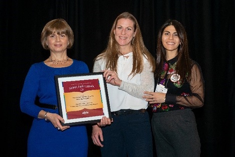 Natalia Udarchik, PCAP Coordinator, Stonegate Health Centre accepts the 2018 Board award with guest