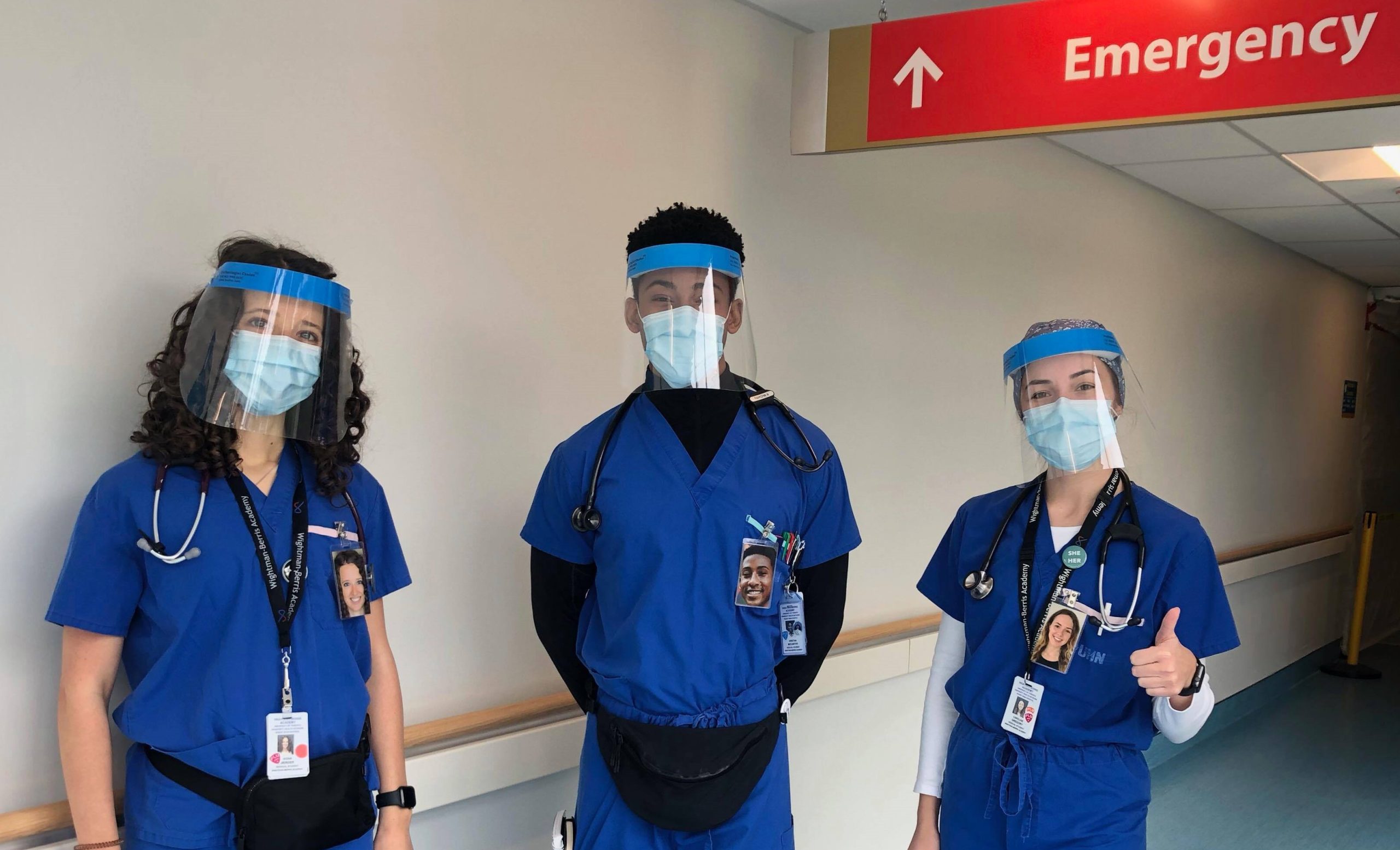 Three staff with portraits